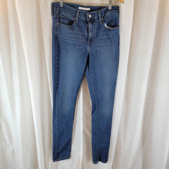 Levi’s Slimming Skinny Women’s Jeans Size 31 Blue Denim Mid Rise - Picture 1 of 5